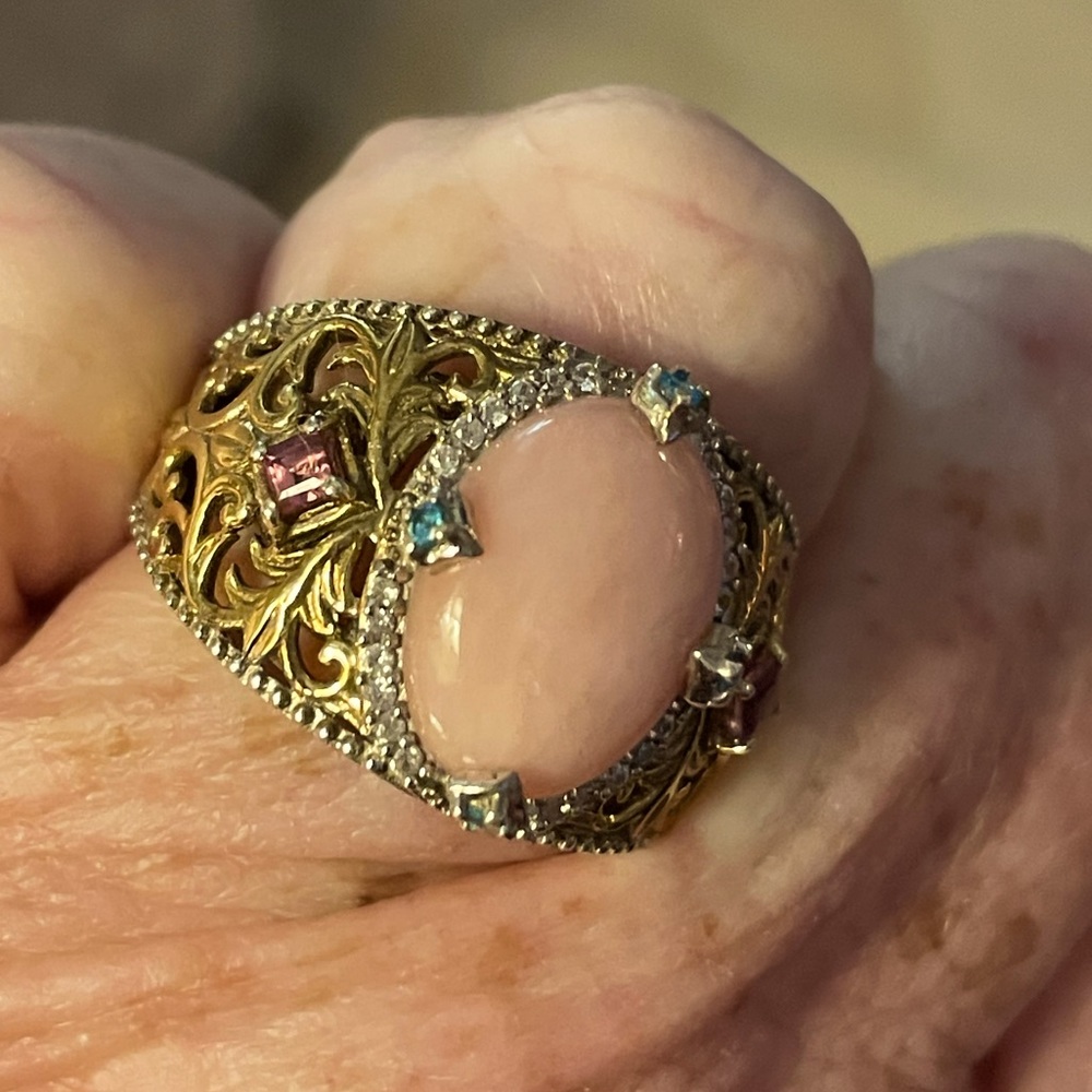 Pink Peruvian Opal ring set with blue apatite and rhodolite stones in gold over